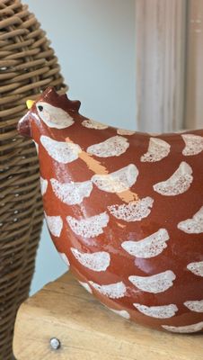 LARGE RED AND WHITE CHICKEN