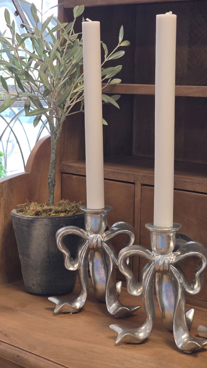 TALL SILVER BOW DINNER CANDLE HOLDER