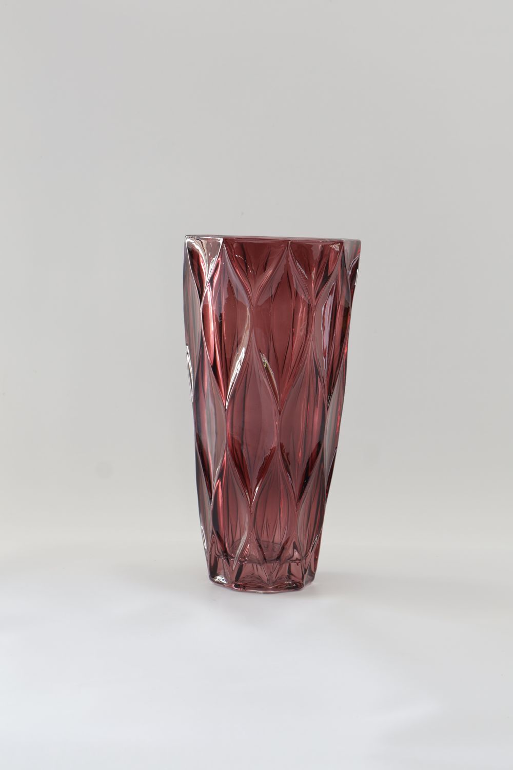 Plum / mauve glass vase features a diamond-faceted crystal design