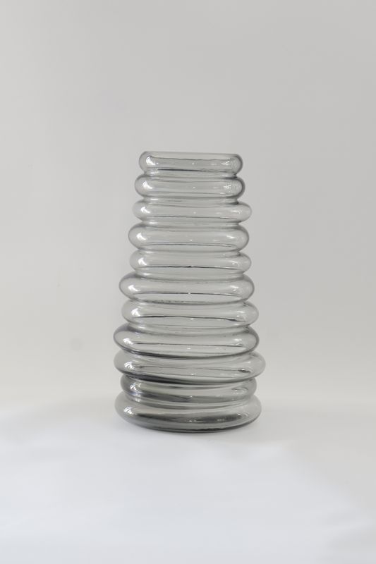 ​Stacked, ribbed beaded or bubble column design.