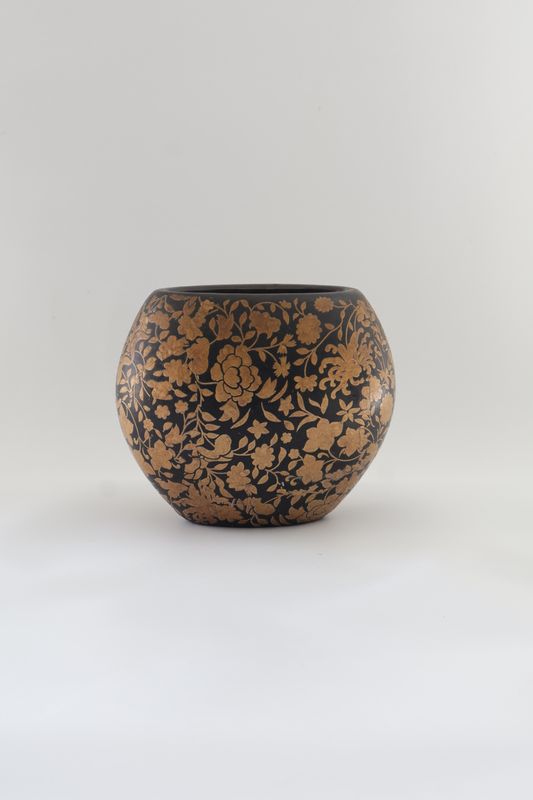 ​Asian-inspired floral globe/fishbowl design with metallic accenting.