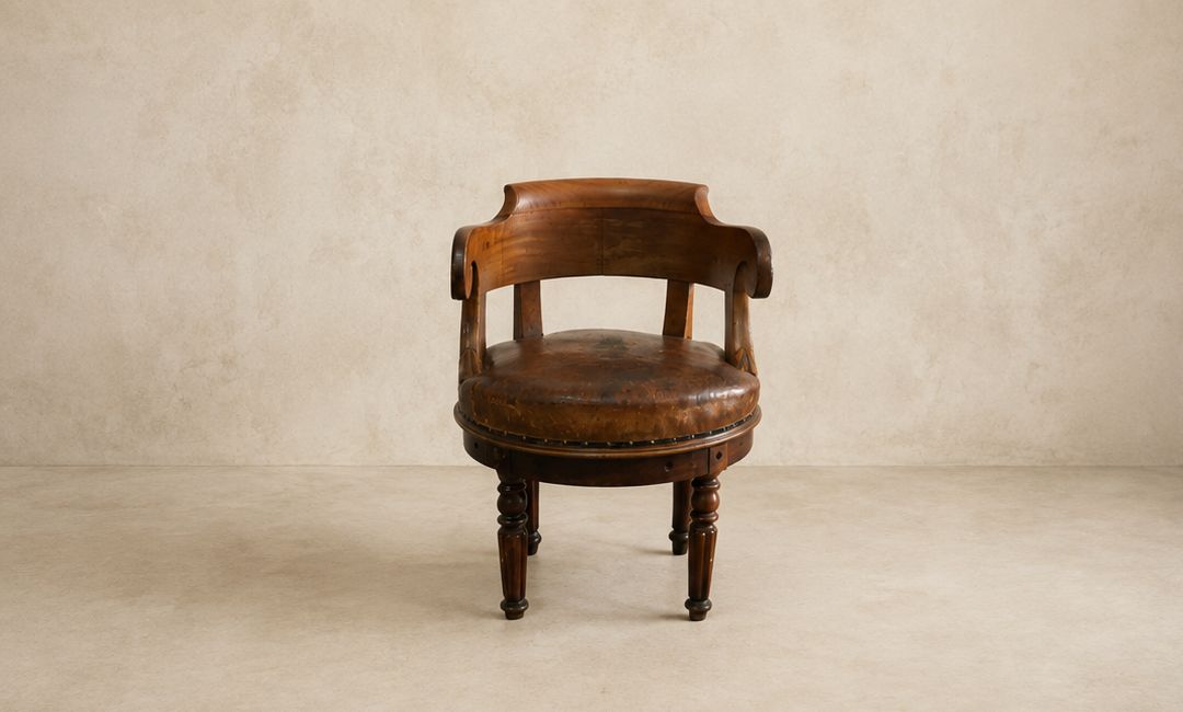 1960's Antique Leather Swivel Chair