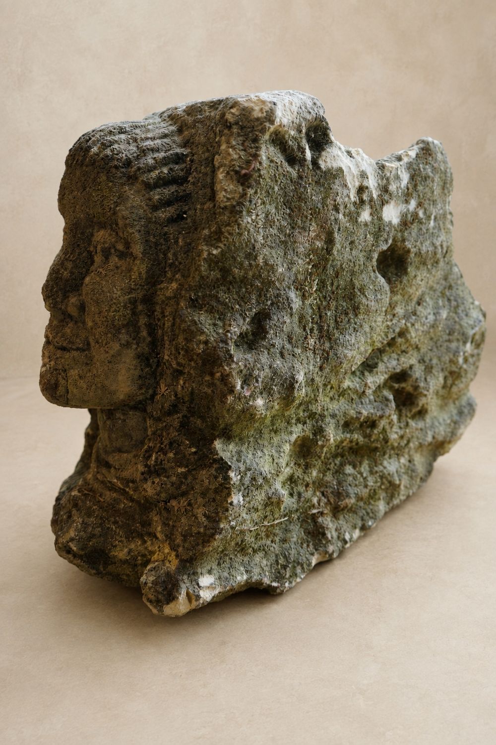 Stone Garden Element Depicting a Woman’s Face