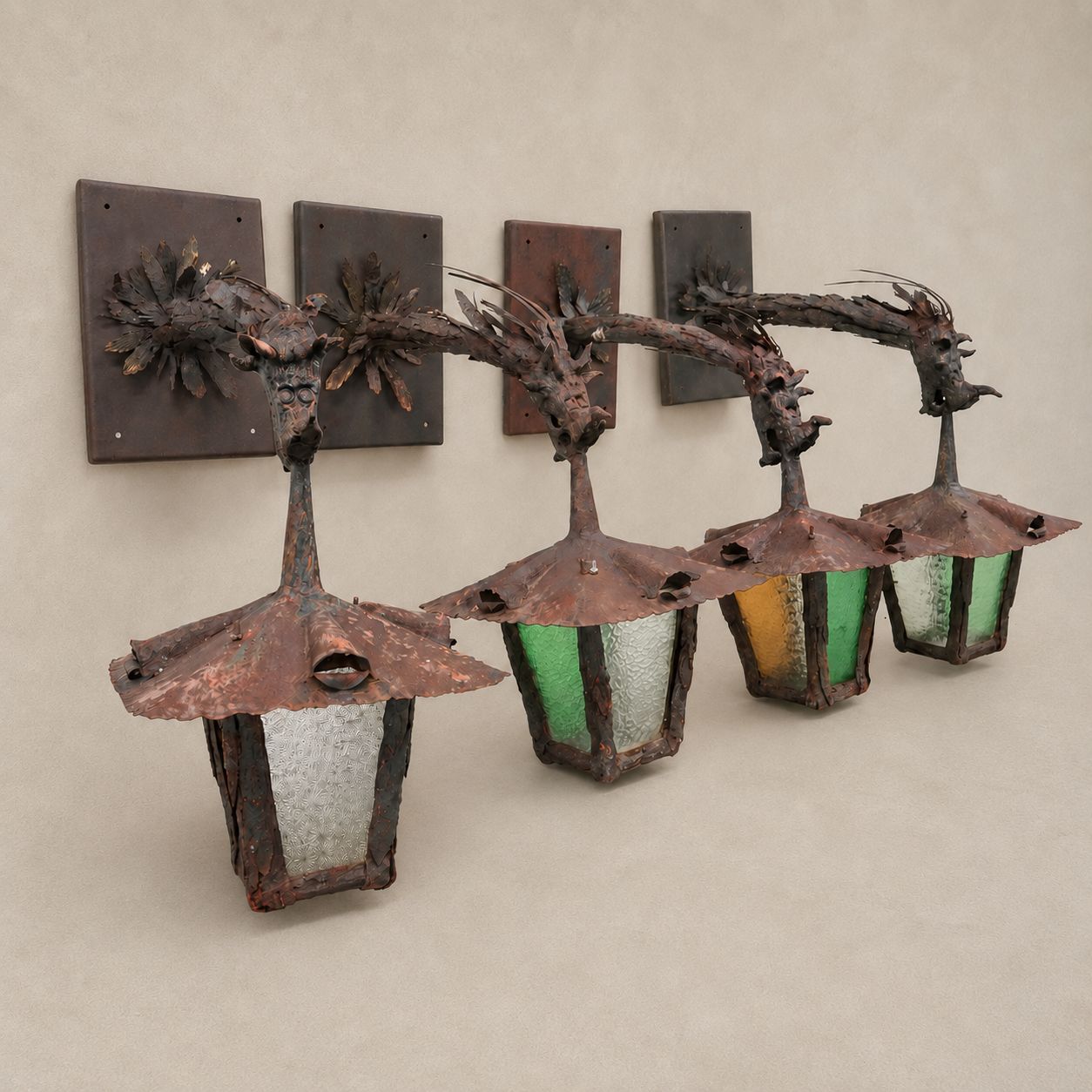 Pair of Antique Decorative Metal Wall Mount Lanterns with Seeded Glass and Stained Glass, Dragon Head Detail with New Custom Iron Back Plate, Newly Rewired, Early 20th Century