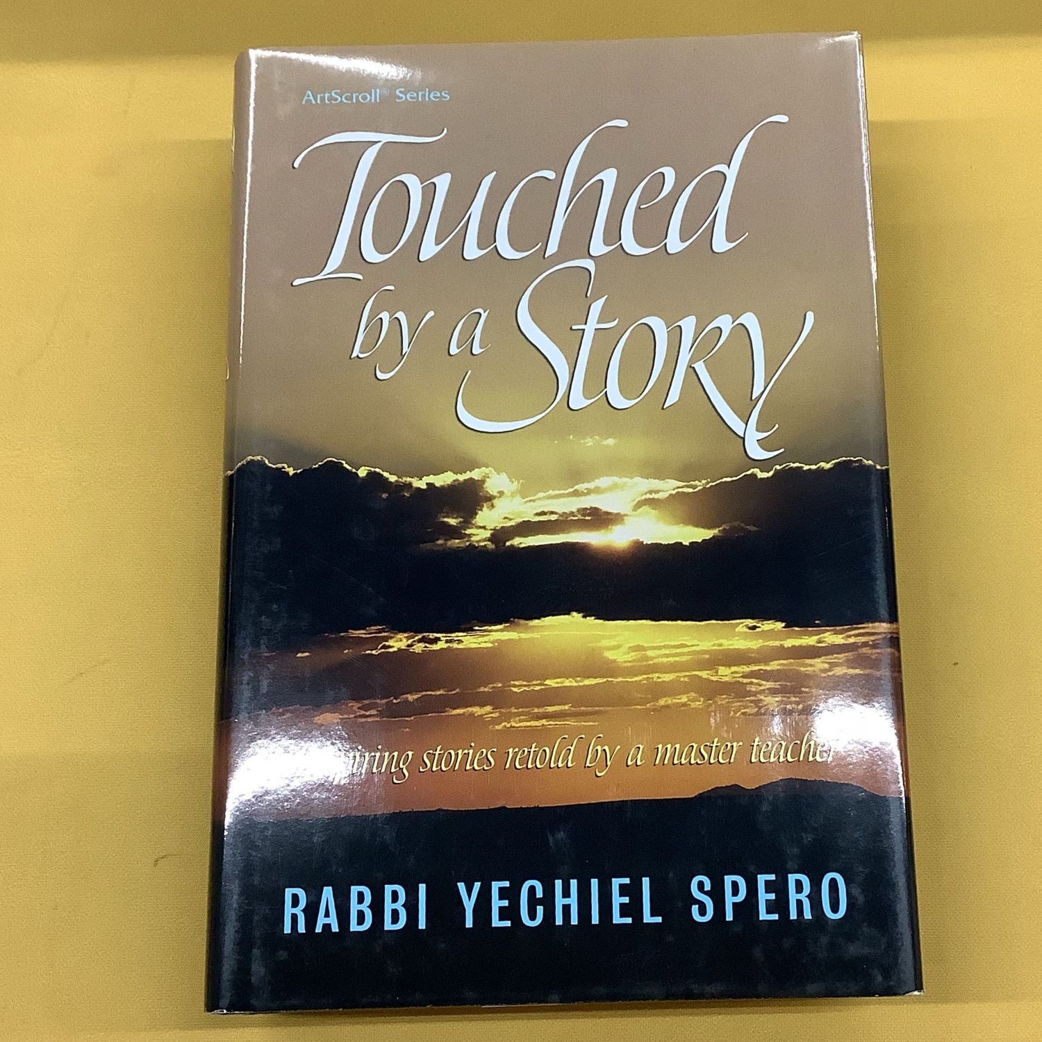 TOUCHED BY A STORY (H/C)