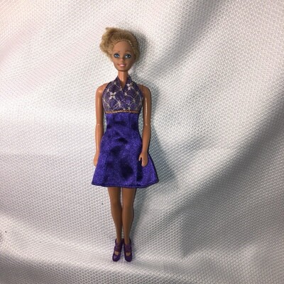 Barbie with purple cocktail dress

