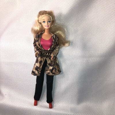 Barbie with jacket, belt and pants.

