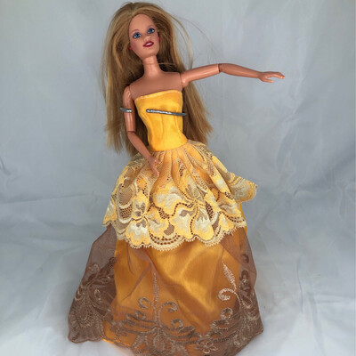 Refurbished Barbie. Long yellow and golden embroidered gown. Long golden hair
