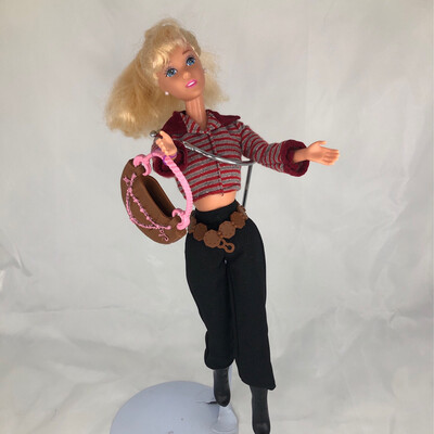 Refurbished Barbie blond hair. Sparkling red sweater with Black Pants and matching boots