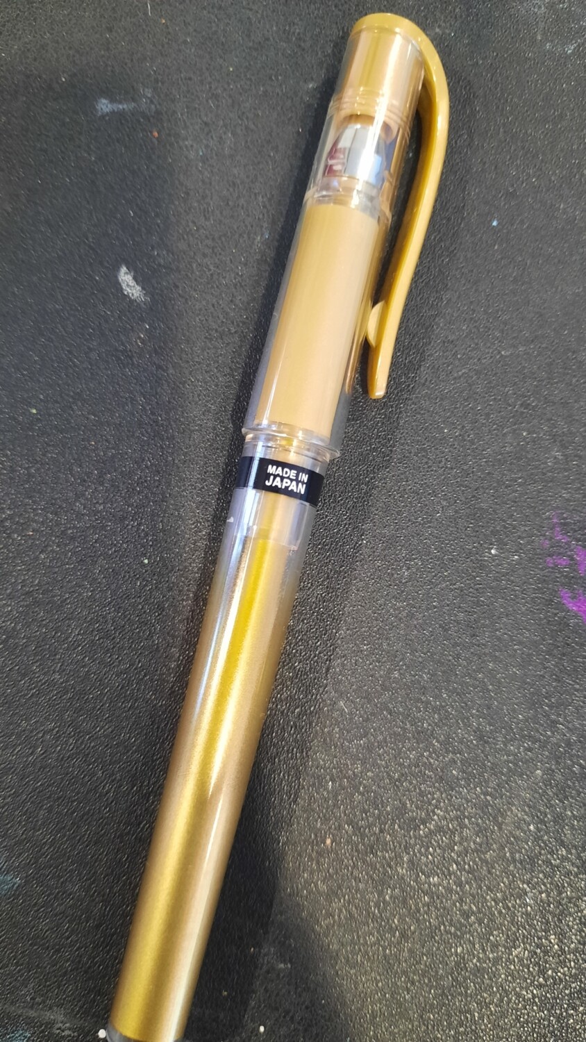 Gold signo gel pen