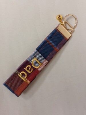 Key fobs wristlets made from clothing