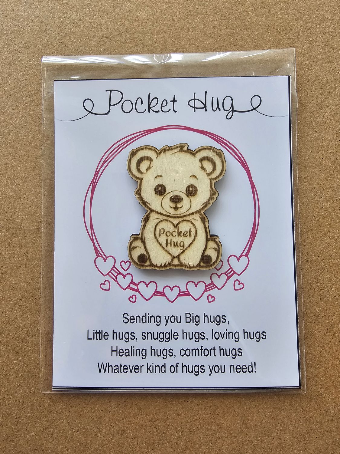 Pocket hug woodcut engraved teddybear