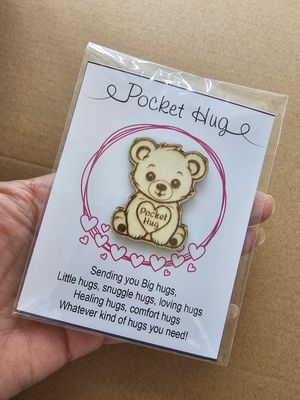 Pocket hug woodcut engraved teddybear