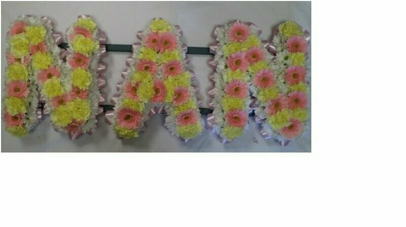 Word based in carnations and gerberas