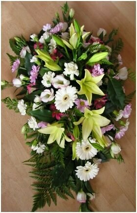 Single ended oasis spray of mixed flowers