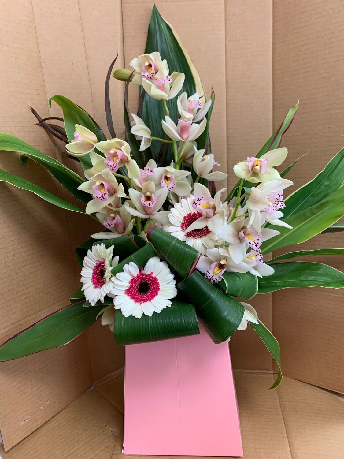 Orchid arrangement in water