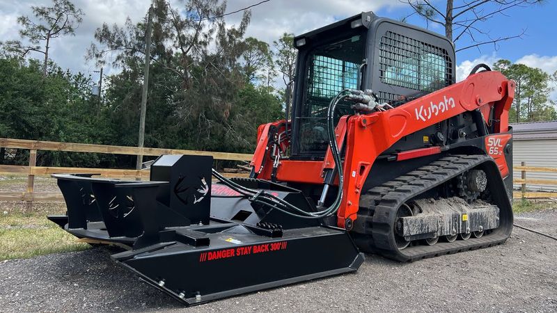 Skid steer w/Brush Hog