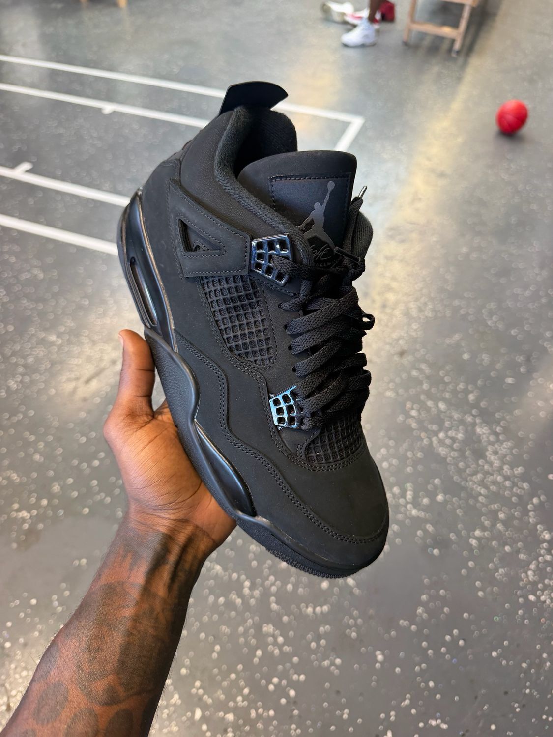 Jordan 4 “Black cats”