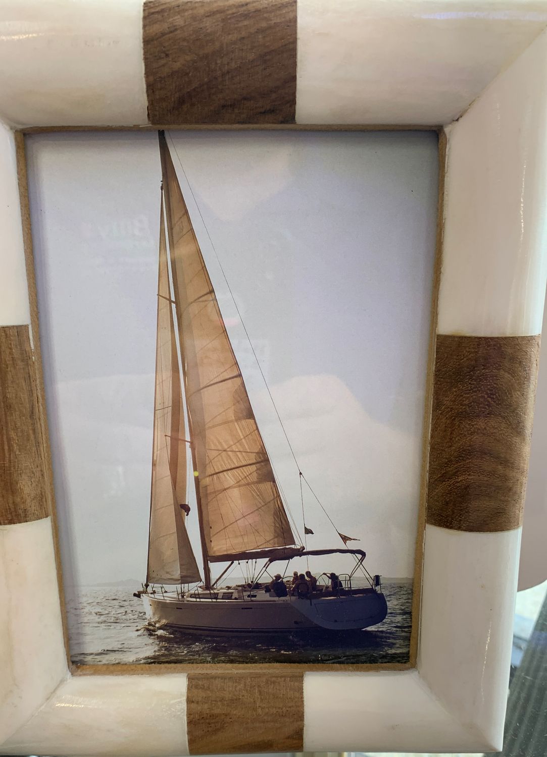 White and brown wooden picture frame