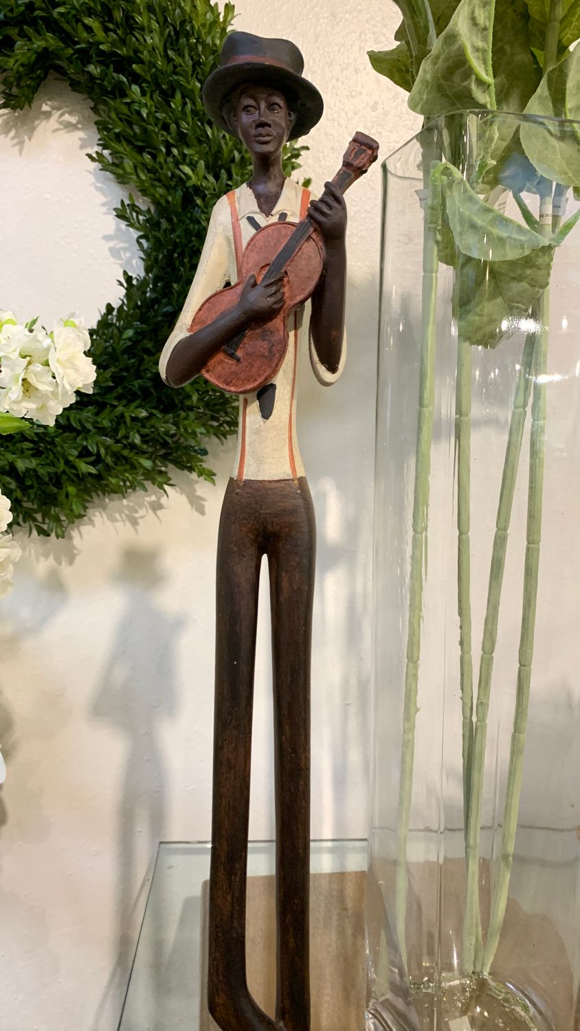 Tall black iron figurines 