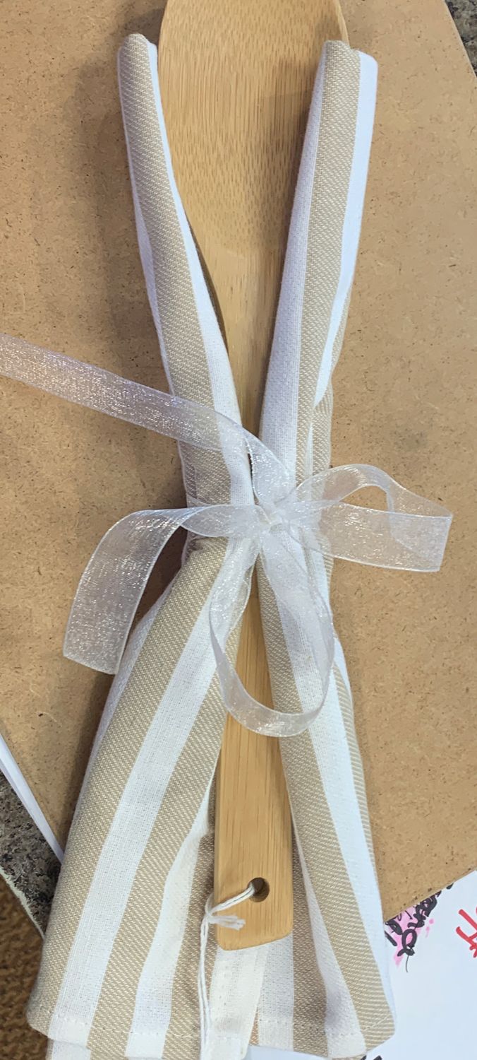 Spoon with kitchen napkin
