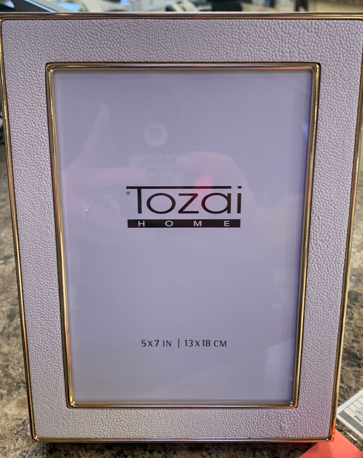 White and gold picture frame