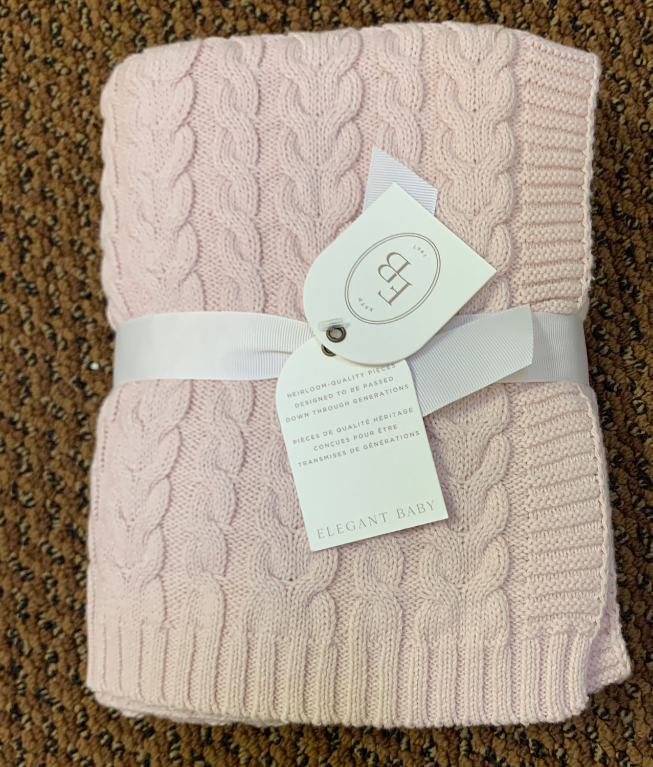 Pink quilted baby blanket