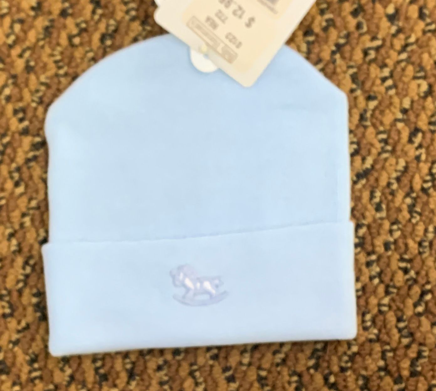 Solid blue rocking horse baby hat