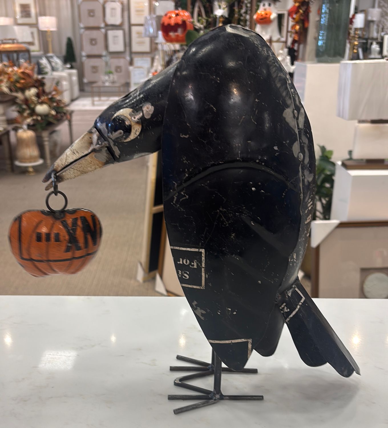METAL CROW HOLDING PUMPKIN