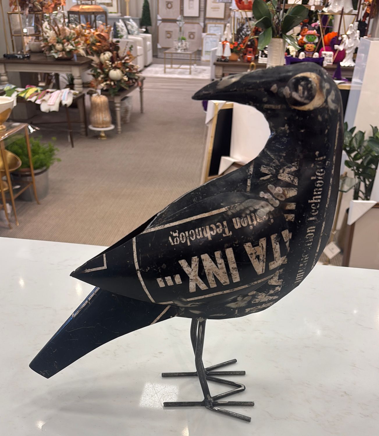 METAL CROW LOOKING BACKWARDS