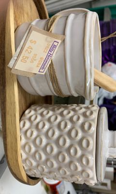 White ceramic coffee and creamer set