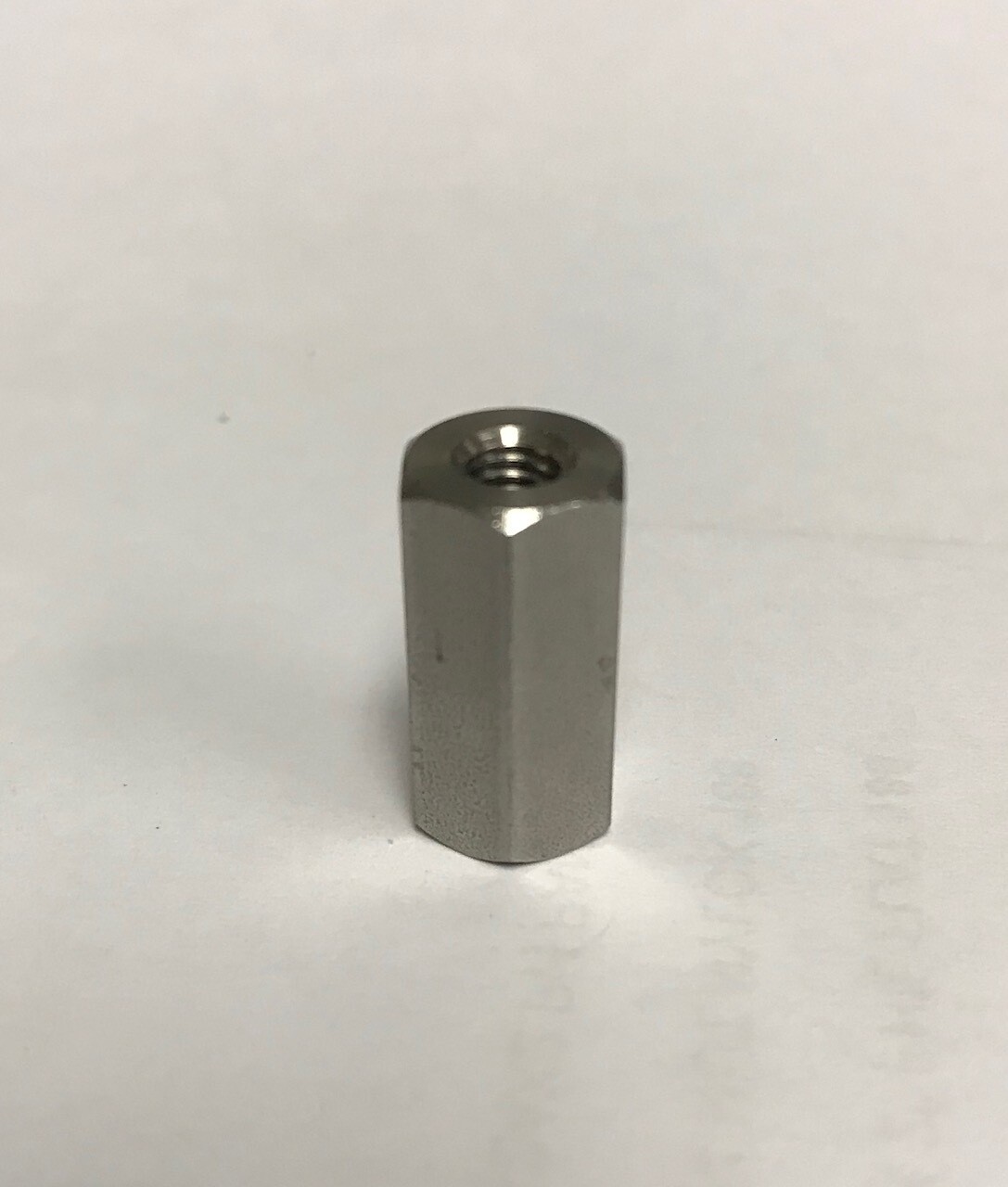 Track hex barrel nut for confined spaces