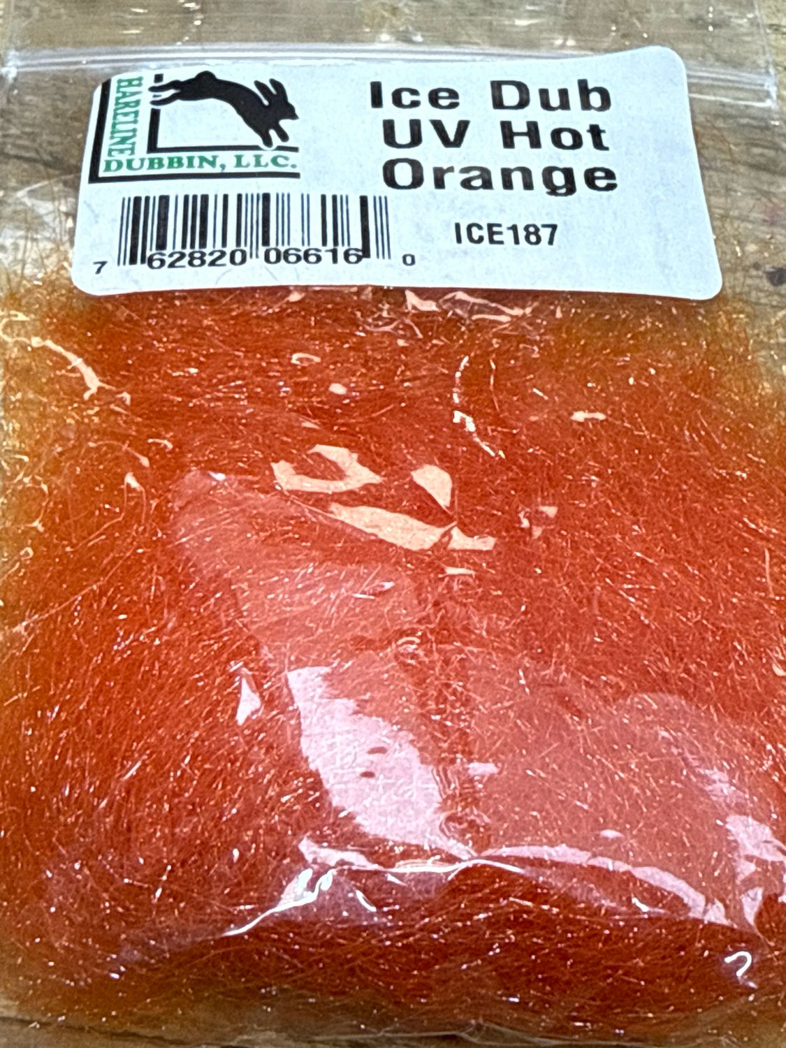Hareline Ice Dubbing. U.V. Hot Orange