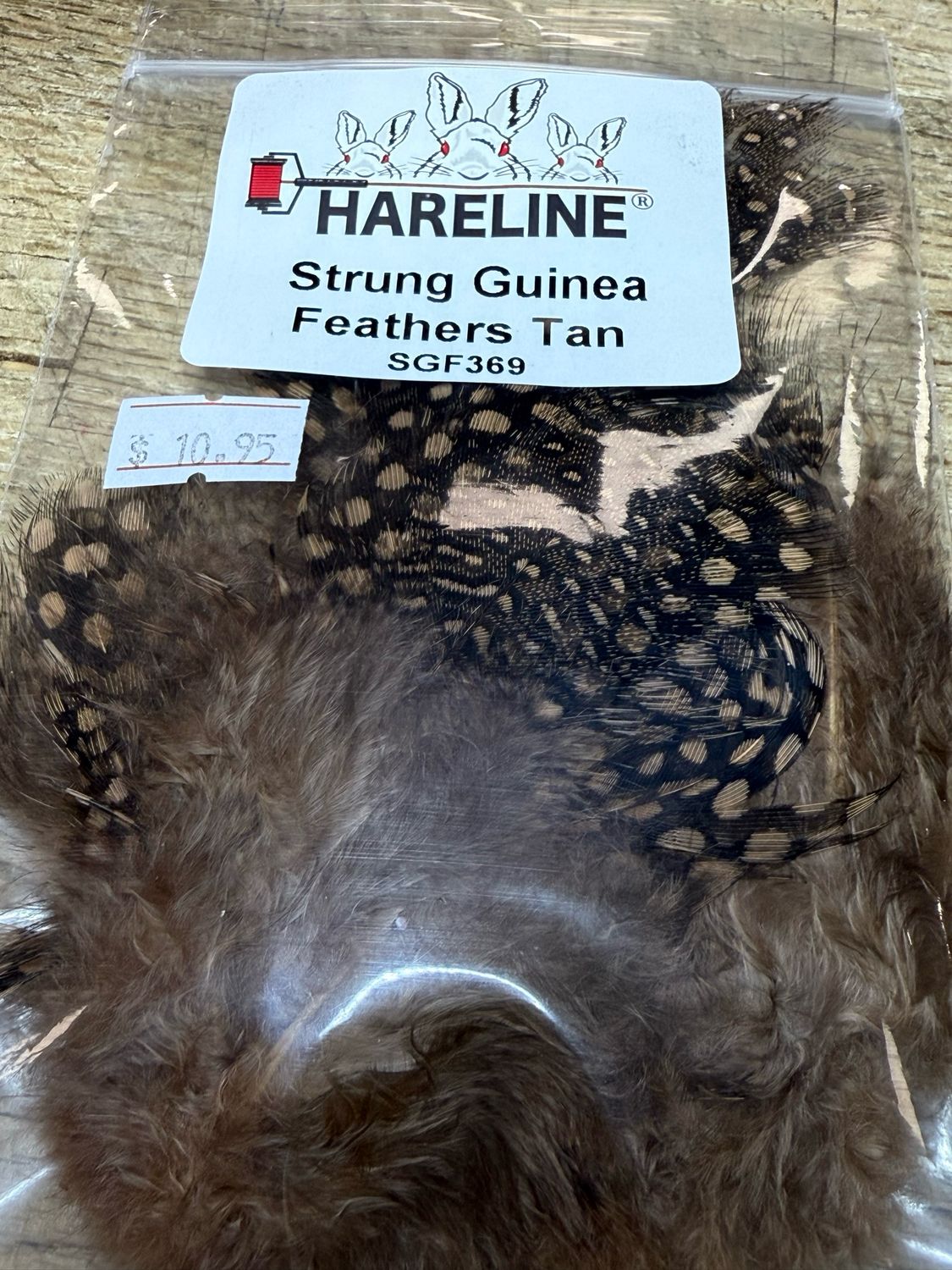 Hareline Strung Guinea Feathers Tan