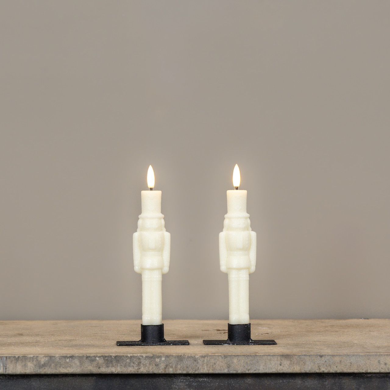 7.5” Cream Shimmer 3D Flame LED Nutcracker Taper Candles (Set of 2)