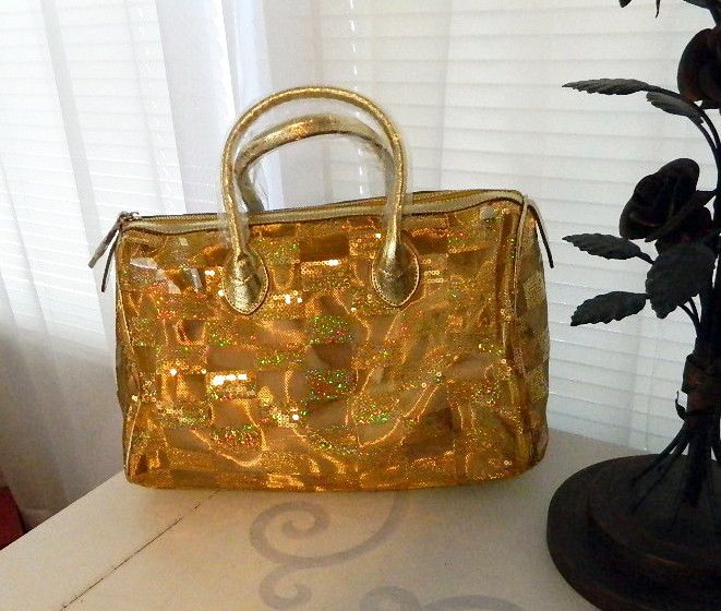 SAPSUCKER   GOLD GLITTER MESH BOWLER BAG