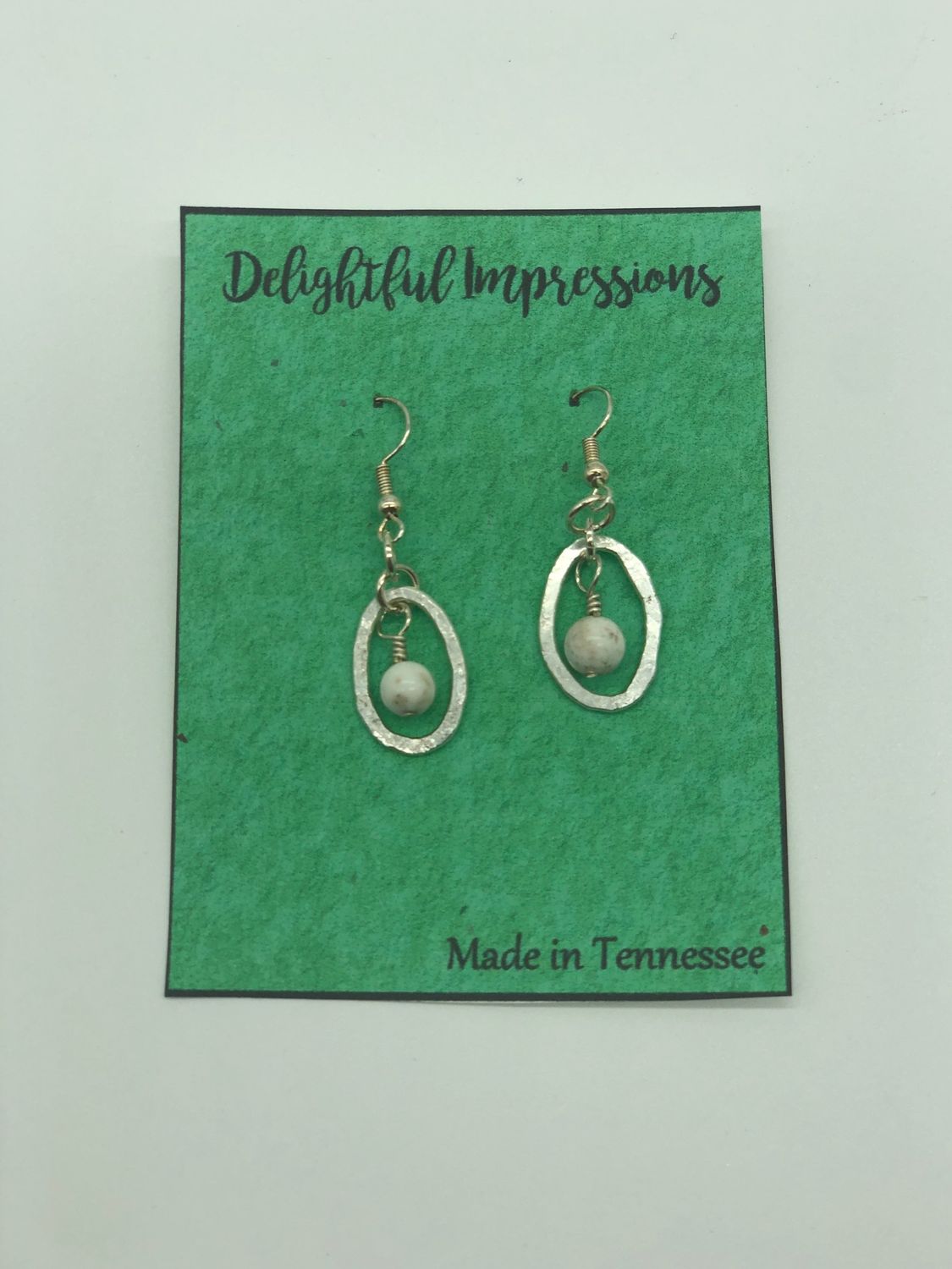 Sterling Silver Small Oval Earrings With White Stone