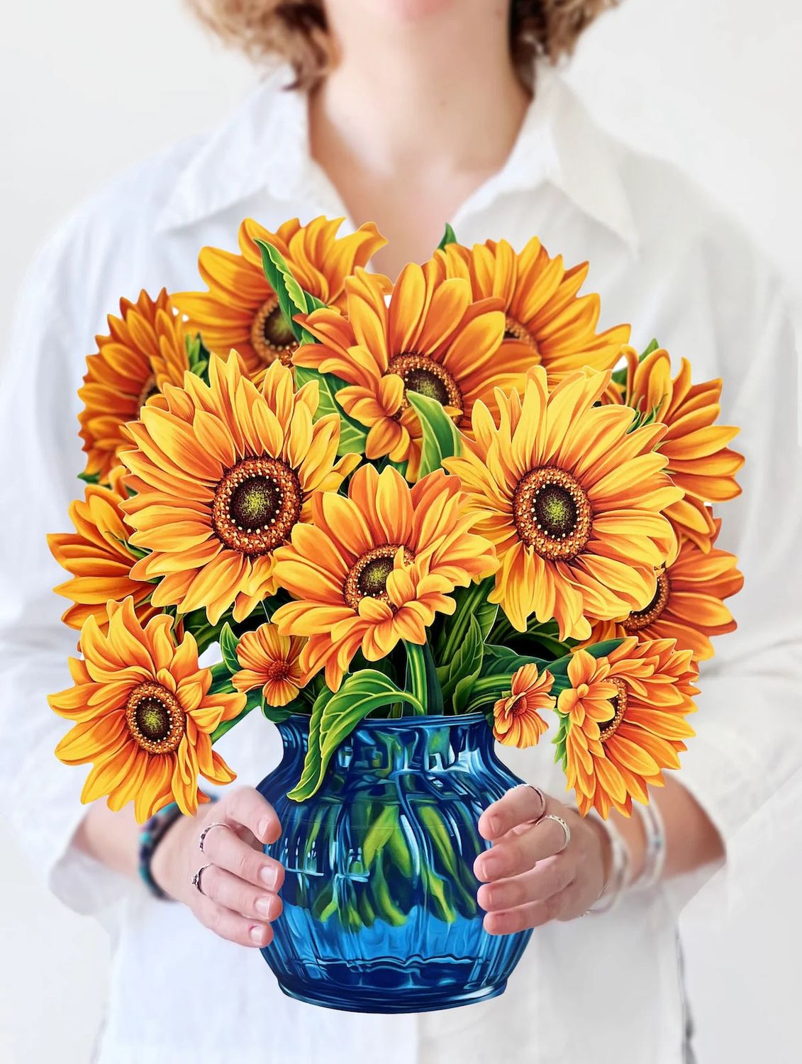Sunflowers in blue vase