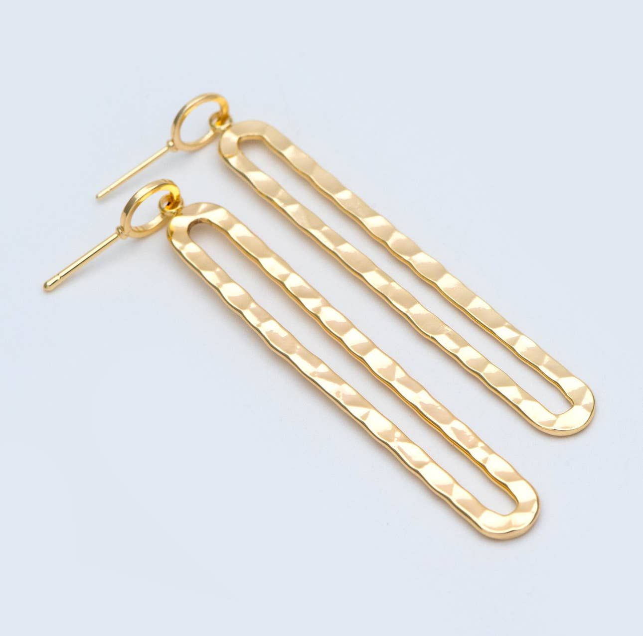 Zola hammered oval hoop studs 18k