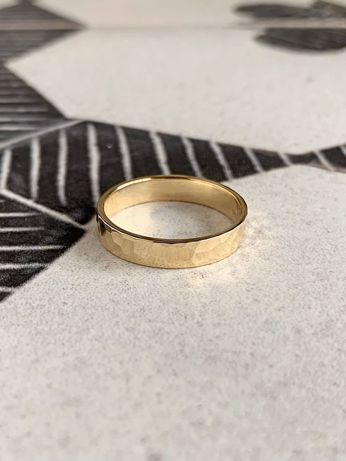 4mm 14k Yellow Gold Polished Light Rock Finish Wedding Band