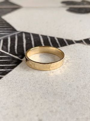 4mm 14k Yellow Gold Polished Light Rock Finish Wedding Band