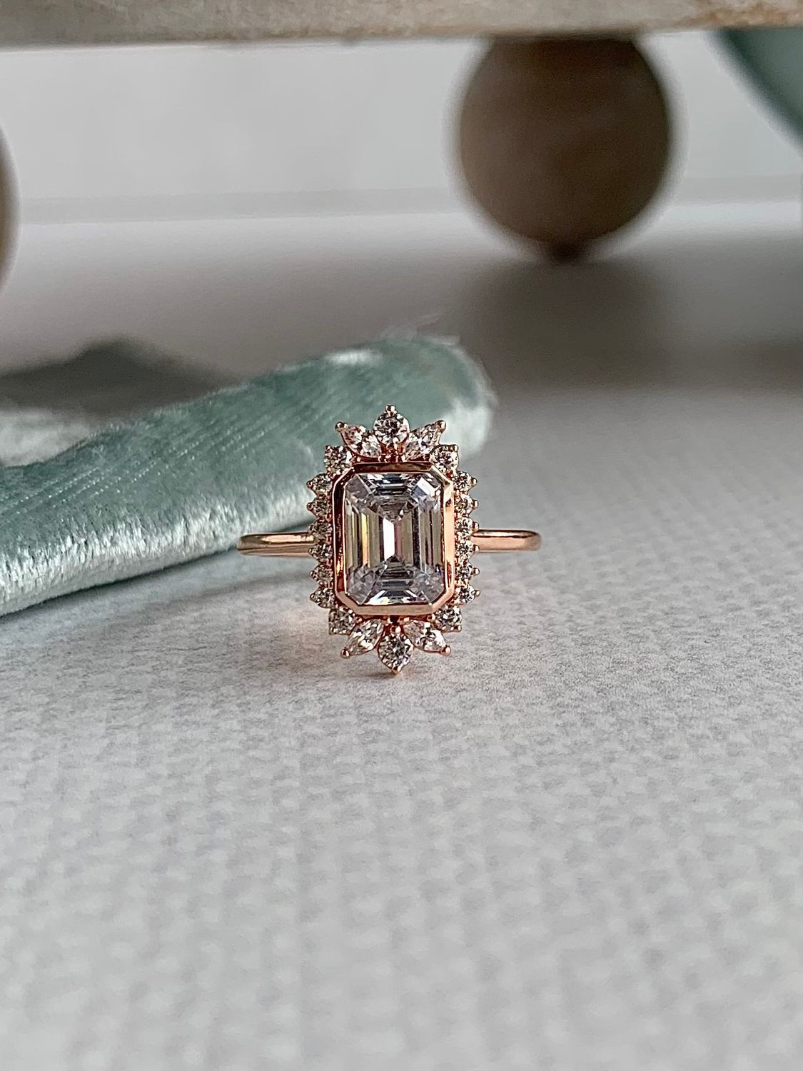 Belladonna Emerald Cut 8X6 Moissanite Center with .33ctw Moissanite Halo Flair 14k Rose Gold Engagement Ring
