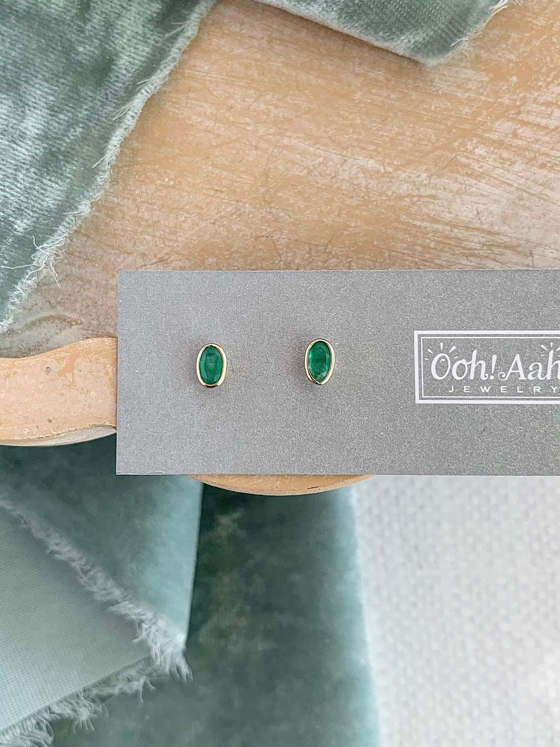 Oval Emerald 14k Yellow Gold Stud Earrings