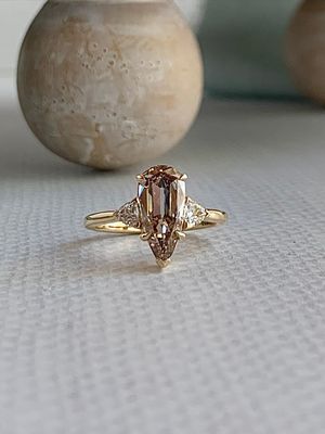 Elysian elonagted pear cut champagne lab diamond 2.21ct  center with 0.28ctw lab diamond accents 14k yellow gold engagement ring