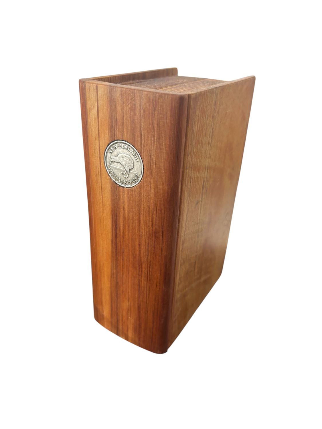Book with pound coin