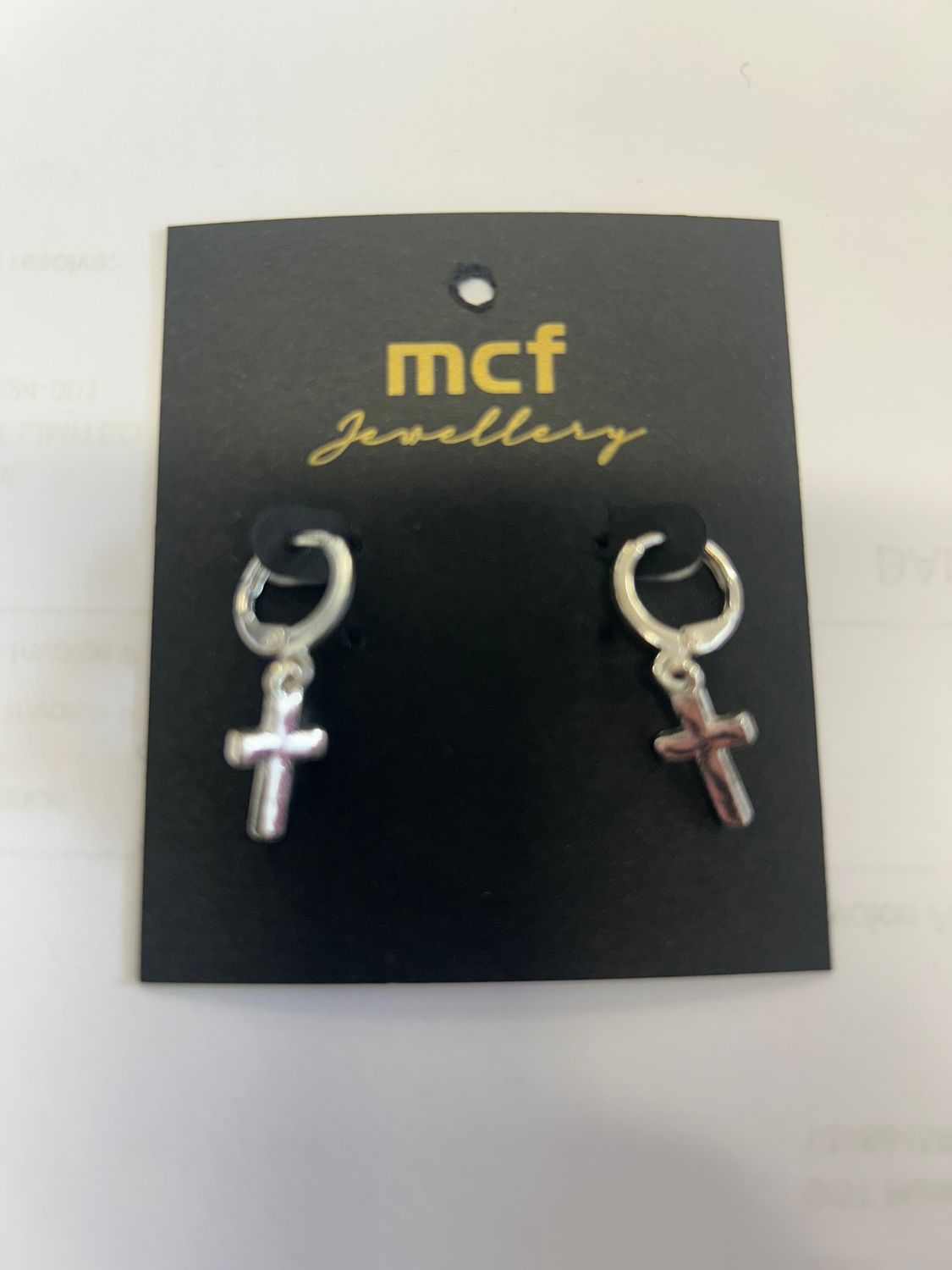 Silvery Earrng Cross