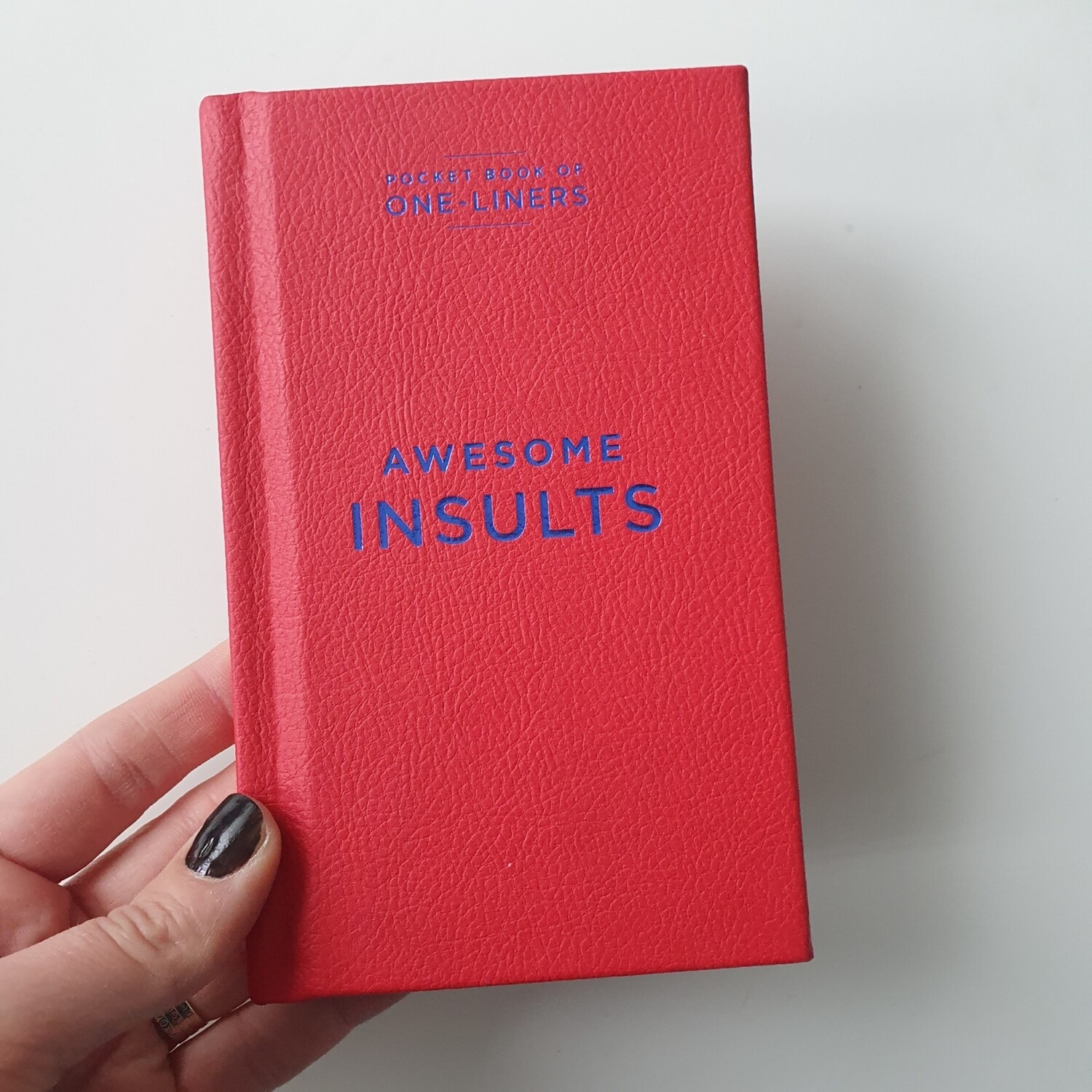 Awesome Insults - red leatherette cover