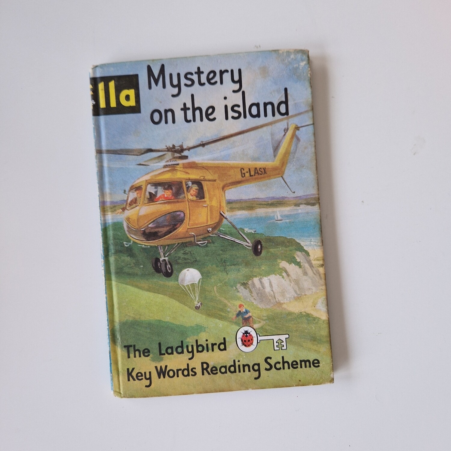 Mystery on the Island, helicopter - Peter & Jane Notebook - Ladybird book