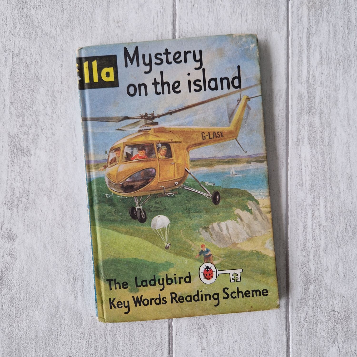 Mystery on the Island 11a Ladybird Book - Peter and Jane, helicopter