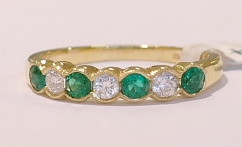 18ct yellow gold emerald and diamond ring